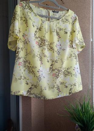 Красивая летняя блуза в цветочный принт свободного силуэта3 фото