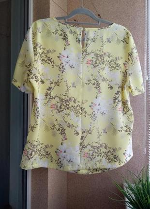 Красивая летняя блуза в цветочный принт свободного силуэта5 фото