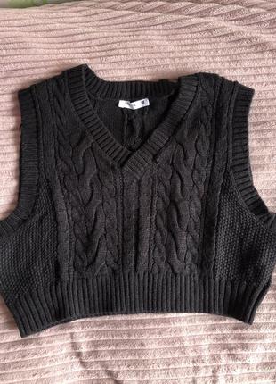 Укорочена жилетка