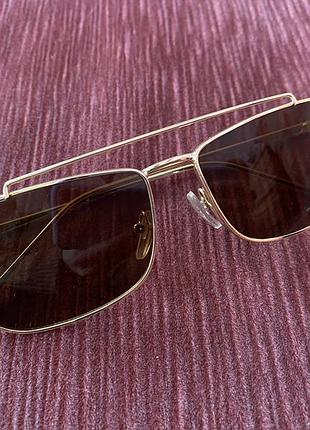 Окуляри, коричневі лінзи