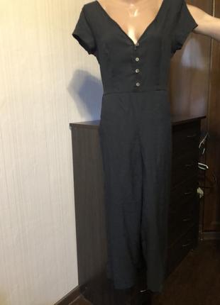 Чорний комбінезон на гудзиках