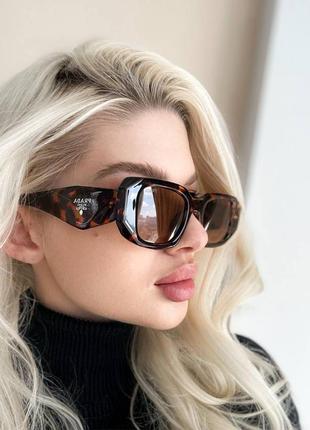 Женские очки prada