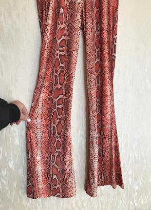 Красивые штаны в змеиный принт 34 размера4 фото