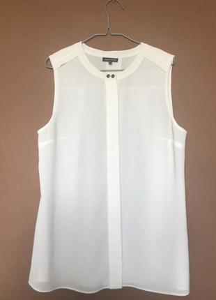 Блузка біла