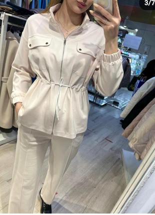 Стильный трикотажный костюм2 фото