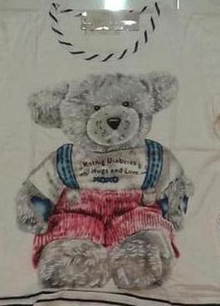 Футболка з кишенями і принтом