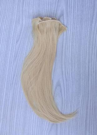 Натуральне волосся на трессах1 фото