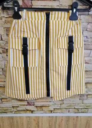 Стремительная мини-юбка в полоску на замке с накладными карманами карго разные цвета и размеры туречи1 фото