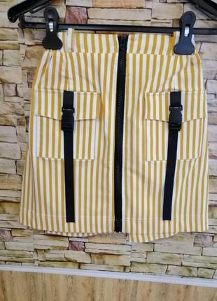 Стремительная мини-юбка в полоску на замке с накладными карманами карго разные цвета и размеры туречи2 фото