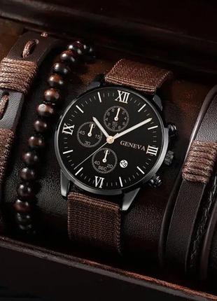 Подарунковий набір для чоловіків: наручний годинник з 3 стильними браслетами - діам. 4 см, довж. 24 см, шир рем 2 см, без коробки.