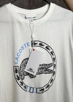 Футболка lacoste біла (лого з блакитним)3 фото