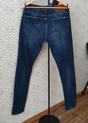 Джинсы мужские