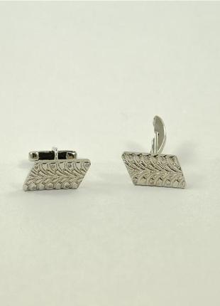 Запонки чоловічі