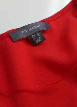 Красивая однотонная красная блуза свободного силуэта с оригинальным широким рукавом7 фото