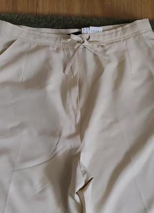 Шикарні брюки бежеві кюлоти палаццо клеш4 фото
