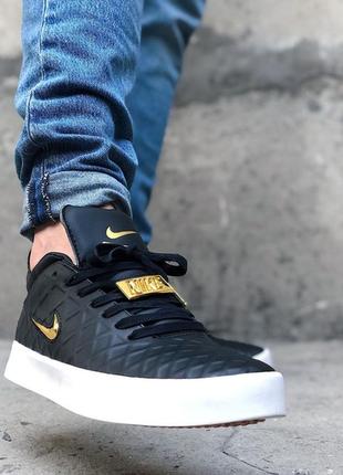 Мужские кожаные кроссовки nike tiempo vetta 17 black gold.6 фото