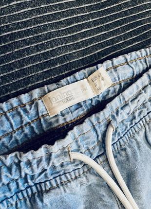 Чоловічі джинси-джогери  блакитні з кишенями карго, на шнурках5 фото