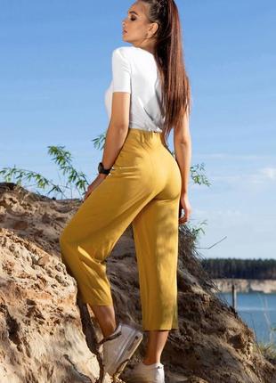 Женские горчичные стильные брюки-кюлоты с высокой посадкой5 фото