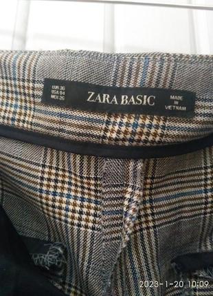Укорочені звужені штани в карту zara5 фото
