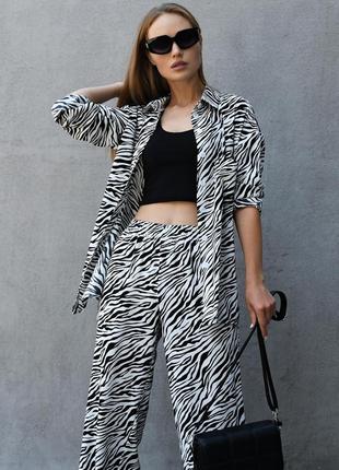 Костюм жіночий стильний вільний з брюками та сорочкою у тваринний принт8 фото