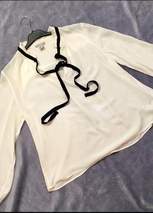 Біла блуза