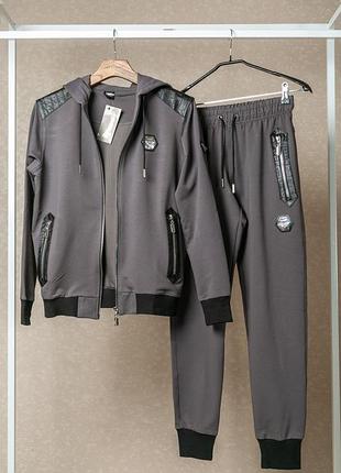 Спортивний костюм зі шкіряними вставками