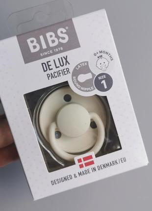 Соска пустушка bibs de lux 0-6 міс молочна