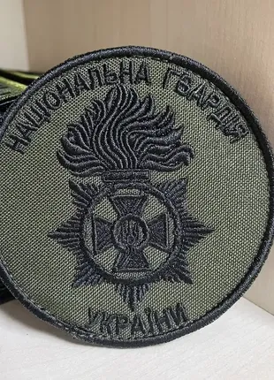 №36 шеврон круглий нгу нитка чорна 8 см
