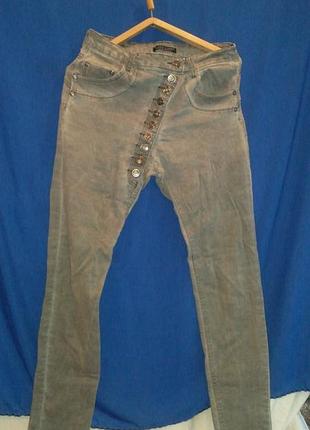 Класні джинси скіні стрейчеві з оригінальною застібкою