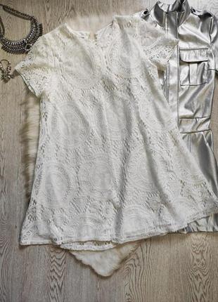 Коротке біле ажурне плаття трапеція вільний гіпюр вишивка короткий рукав1 фото