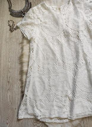 Коротке біле ажурне плаття трапеція вільний гіпюр вишивка короткий рукав3 фото