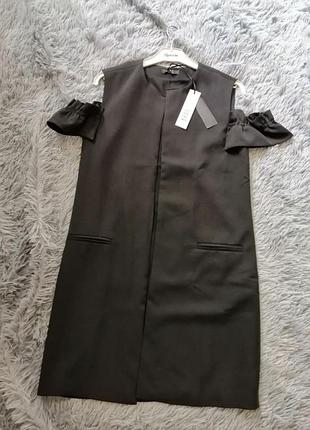 Стильна жилетка з маленькими рукавчиками крильцями рюшами