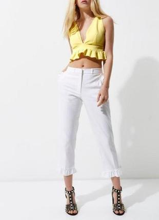 Желтый топ с рюшами фирмы river island