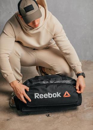 Чоловіча спортивна сумка reebok, чорна дорожня сумка рібок в спотзал на довгому ремінці8 фото