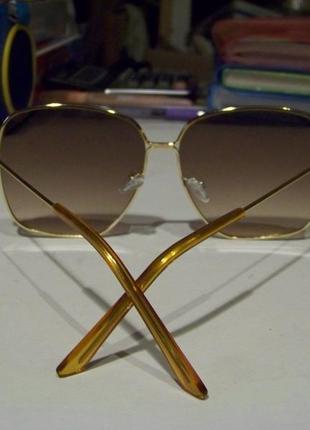 Крупные квадратные солнцезащитные очки с золотой оправой и линзой коричневый градиент8 фото