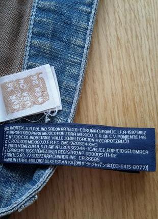 Джинсовая мини юбка с кармашками и потертостями4 фото