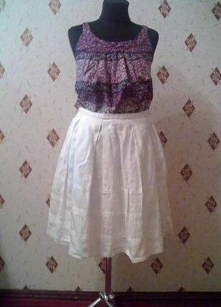 Белоснежая  юбка клёш с карманами