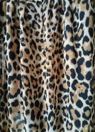 Юбка шифоновая расцветки "леопард" удлиненная сзади на подкладке.4 фото