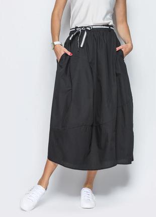 Довга стильна чорна асиметрична літня спідниця-балон з кишенями