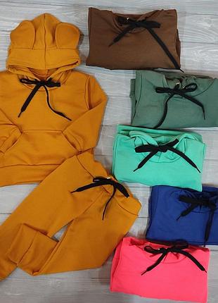 Спортивный костюм на мальчика и девочку