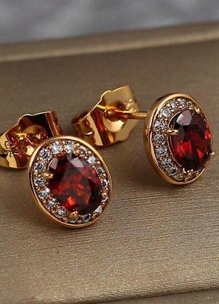 Сережки гвоздики xuping jewelry овальні малинки з червоним камінням 10 мм золотисті