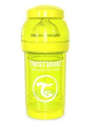 Пляшка для годування twistshake антиколькова 180 мл, жовта (24882)1 фото