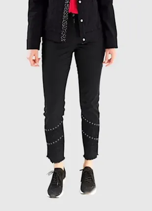 Новые стильные шикарные джинсы,  с кружевом и стразами гламурные. германия размер европ.44 наш 48-502 фото