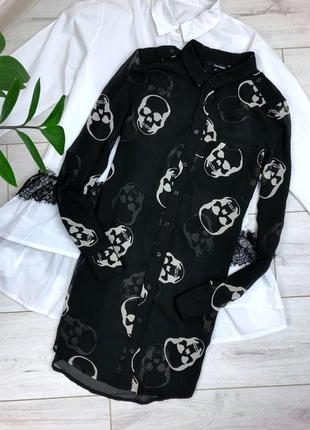 Чёрная блузка в черепочки