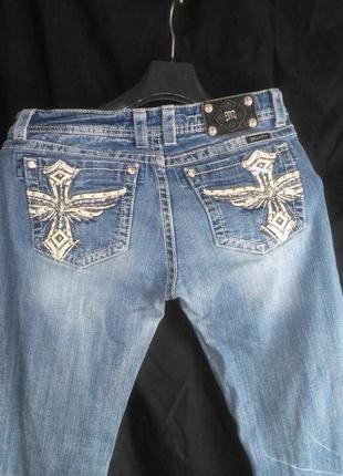 Классные фирменные джинсы ( на карманах есть стразы  )