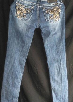 Классные фирменные джинсы скинни стрейч ( с стазами на карманах )1 фото