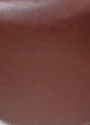 Сумка "седло" кросс-боди из эко кожи с клапаном и узором