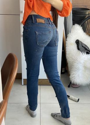 Джинси бедровки, джинси з рваностями1 фото