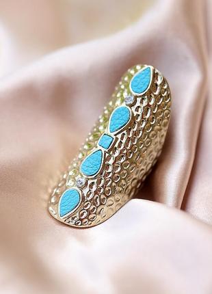 Длинное кольцо со вставками из бирюзовой кожи. бренд