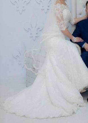 Шикарное свадебное платье со шлейфом5 фото